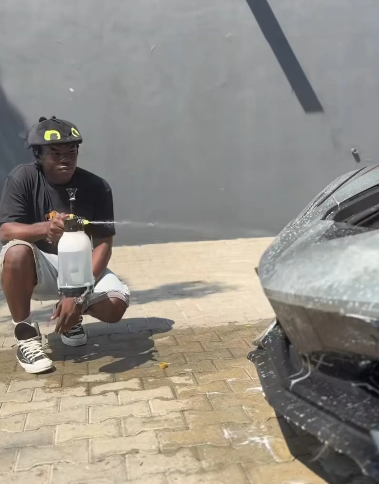 PPF installation surface prep spray slip solution on Corvette C8 front bumper Lagos